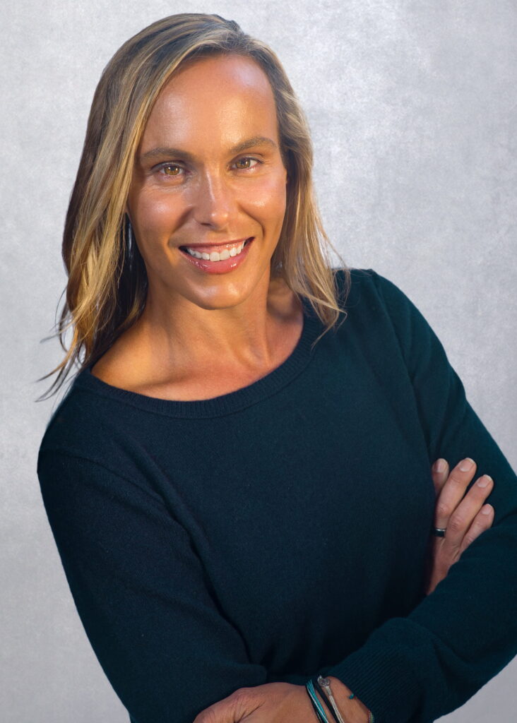 Wendy Jones arms crossed white background portrait